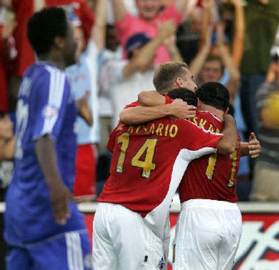 
MLS All-Star Dwayne De Rosario and teammates celebrate after a goal. 
 (Associated Press / The Spokesman-Review)