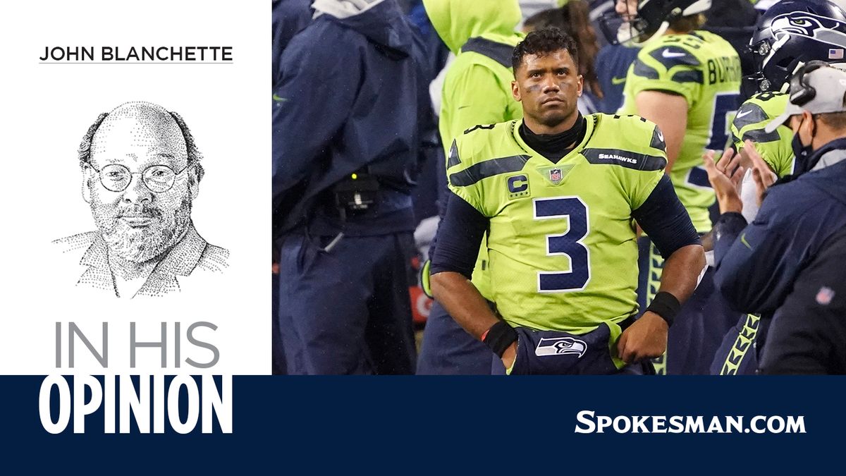 Seattle quarterback Russell Wilson (3) looks up as he stands on the sidelines against the Minnesota Vikings late in the second half before leading the Seahawks on a game-winning drive of their NFL football game, Sunday, Oct. 11, 2020, in Seattle. (Associated Press)