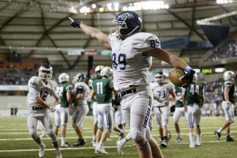 Gonzaga Prep’s Evan Weaver  celebrates after scoring a touchdown against Skyline during the second half of the State 4A football championship game in Tacoma.