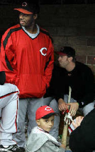 
Ken Griffey Jr., left, was the host for Kobe Stenson, 4, on Monday. 
 (Associated Press / The Spokesman-Review)