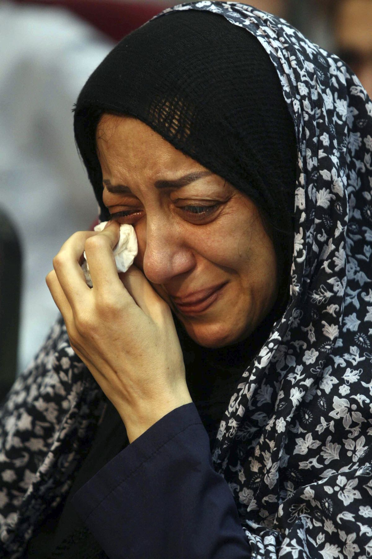 French Embassy staff member Nazak Afshar weeps in court  during her trial Saturday. (Hanif Shoaee / The Spokesman-Review)