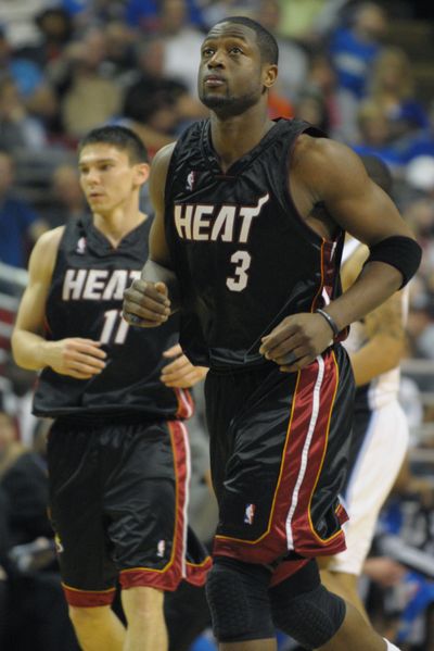 Dwyane Wade’s hot hand wasn’t enough as Orlando routed Miami.  (Associated Press / The Spokesman-Review)