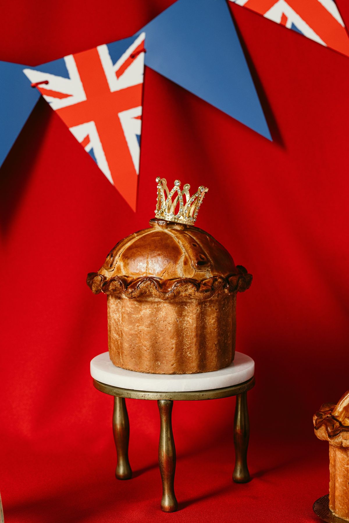 The limited-edition Crown Jewel Celebration Pork Pie, created by the British chef Calum Franklin in collaboration with the pie maker Dickinson & Morris in London on April 24, 2023. A careful eater and a champion of organic farming, King Charles III has a potent pulpit for changing the national diet – though that royal quiche has met some resistance.  (New York Times)