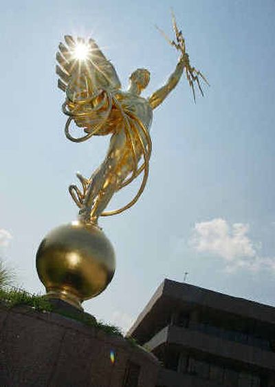 
The Spirt of Communication statue is seen at the AT&T headquarters.
 (Associated Press / The Spokesman-Review)