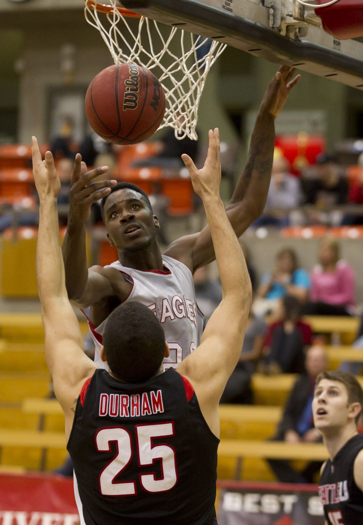 After missing his shot, Tremayne Johnson grabs the rebound over Seattle University�s Brandon Durham (25) in the first half Wednesday in Cheney. (Colin Mulvany / The Spokesman-Review)