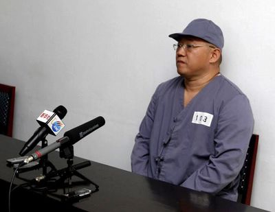 American missionary Kenneth Bae speaks to reporters at Pyongyang Friendship Hospital in Pyongyang, North Korea, on Monday. Bae, 45, has been jailed in North Korea for more than a year. (Associated Press)