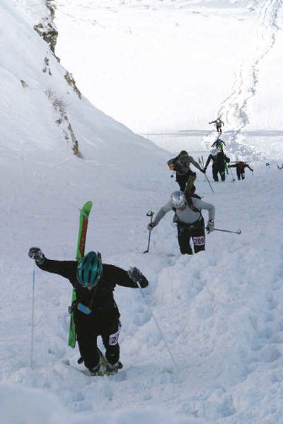 
Entrants in the Wasatch PowderKeg backcountry ski race outside Salt Lake City are required to carry an avalanche beacon, shovel and probe just as they would for any ski mountaineering trip. 
 (Associated Press / The Spokesman-Review)