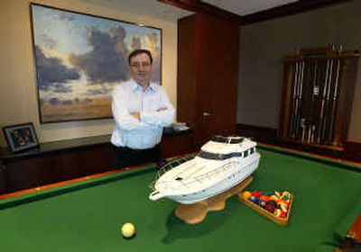 
George Buckley, chief executive officer of Brunswick Corp., poses in his office at the company headquarters in Lake Forest, Ill. Founded on billiards and best-known for bowling, Brunswick is flexing its recreational muscle in the boating business. 
 (Associated Press / The Spokesman-Review)