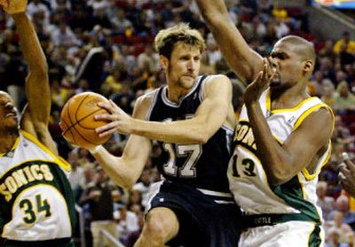 
Guard Brent Barry, center, left Seattle teammates Ray Allen, left, and Jerome James to sign with perennial title contender San Antonio.
 (Associated Press / The Spokesman-Review)