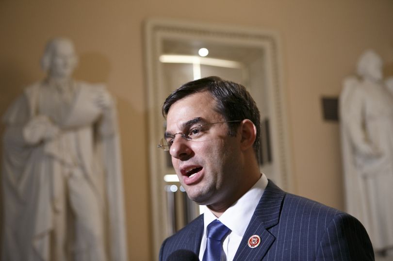 Rep. Justin Amash, R-Mich., comments about the vote on the defense spending bill and his failed amendment that would have cut funding to the National Security Agency’s program that collects the phone records of U.S. citizens and residents, at the Capitol on Wednesday. The Amash Amendment narrowly lost, 217-205. (Associated Press)