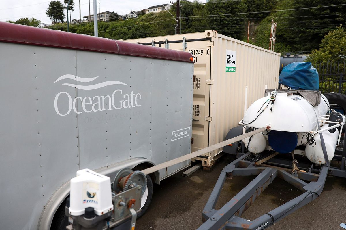 The OceanGate logo is pictured on a trailer at the Port of Everett Boat Yard on Tuesday.  (Jason Redmond/Getty Images)