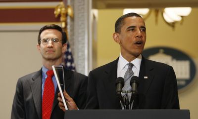 President Barack Obama, with budget director Peter Orszag, holds up a document titled, “Terminations, Reductions, and Savings” as he speaks about the fiscal 2010 federal budget Thursday.  (Associated Press / The Spokesman-Review)