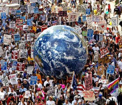 
A crowd fills a Manhattan avenue during a protest march leading up to the Republican National Convention site in New York on Sunday. The march was sponsored by United for Peace and Justice. The GOP convention is scheduled to begin today. 
 (Associated Press / The Spokesman-Review)