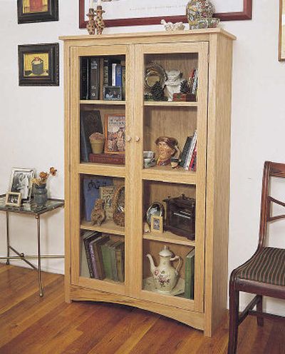 
This bookcase project features three adjustable shelves behind tempered-glass doors.
 (U-BILD / The Spokesman-Review)