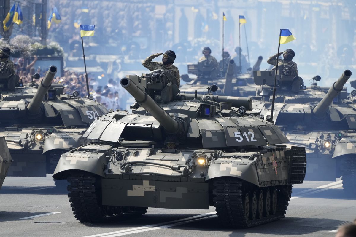 Tanks ride along Khreshchatyk Street, during a military parade to celebrate Independence Day in Kiev, Ukraine, Tuesday, Aug. 24, 2021.  (Efrem Lukatsky)