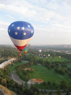Hot-air balloons drift over Boise on Wednesday, the first day of this year's Spirit of Boise Balloon Classic; mass balloon launches are scheduled each morning through Sunday from Ann Morrison Park. (Courtesy photo / Spirit of Boise Balloon Classic)