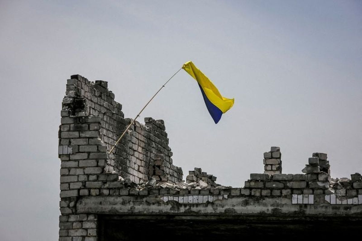 A Ukrainian national flag is seen, amid Russia