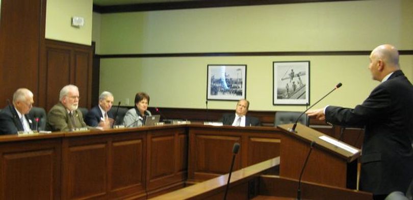 Mike Kane, lobbyist for the Idaho Sheriffs Association, proposes legislation to excuse boaters from reporting accidents with damage of $500 or more, in favor of a $1,500 threshhold, to match up with car accidents. The Senate Judiciary Committee voted unanimously to introduce the bill. (Betsy Russell)