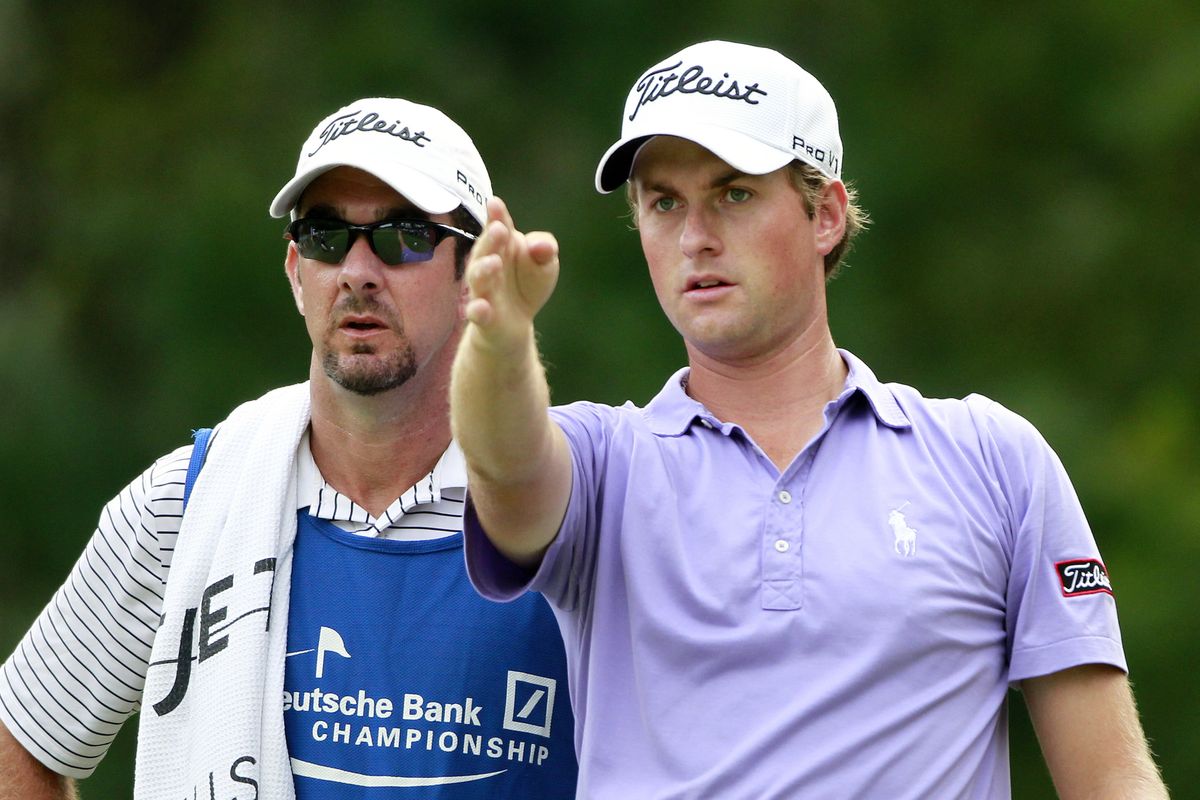 Caddie Paul Tesori, left, with Webb Simpson, benefitted from Bubba Watson winning The Masters. (Associated Press)