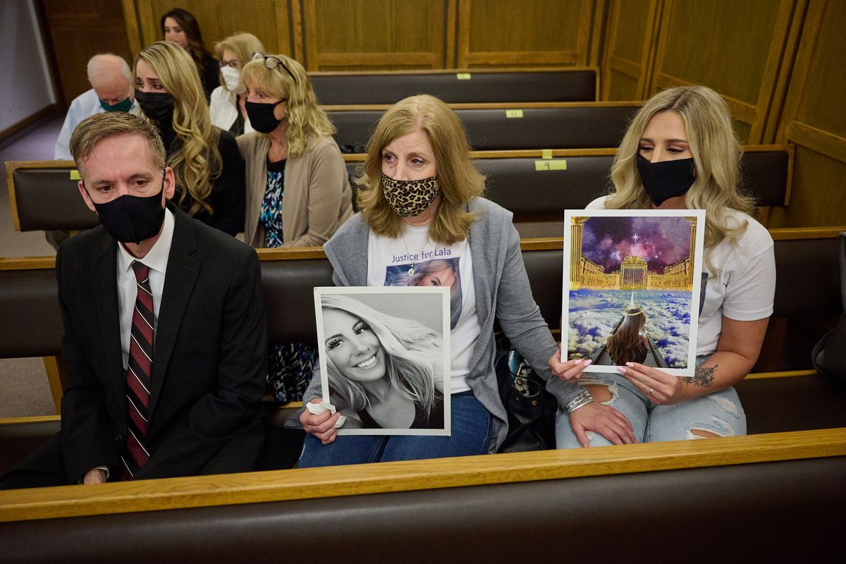 Michael and Christy Young, parents of Makayla Young, with their daughter Emily Young, attend the plea hearing for Anthony Fuerte, who was set to take a plea deal for the murder of Makayla Young, on Friday in Spokane County Superior Court.  (COLIN MULVANY/THE SPOKESMAN-REVIEW)