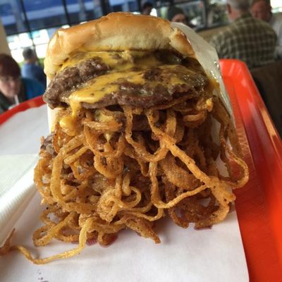 D.Lish’s Hamburgers created this seven-layer cheeseburger last year in honor of Zags basketball player Przemysław 