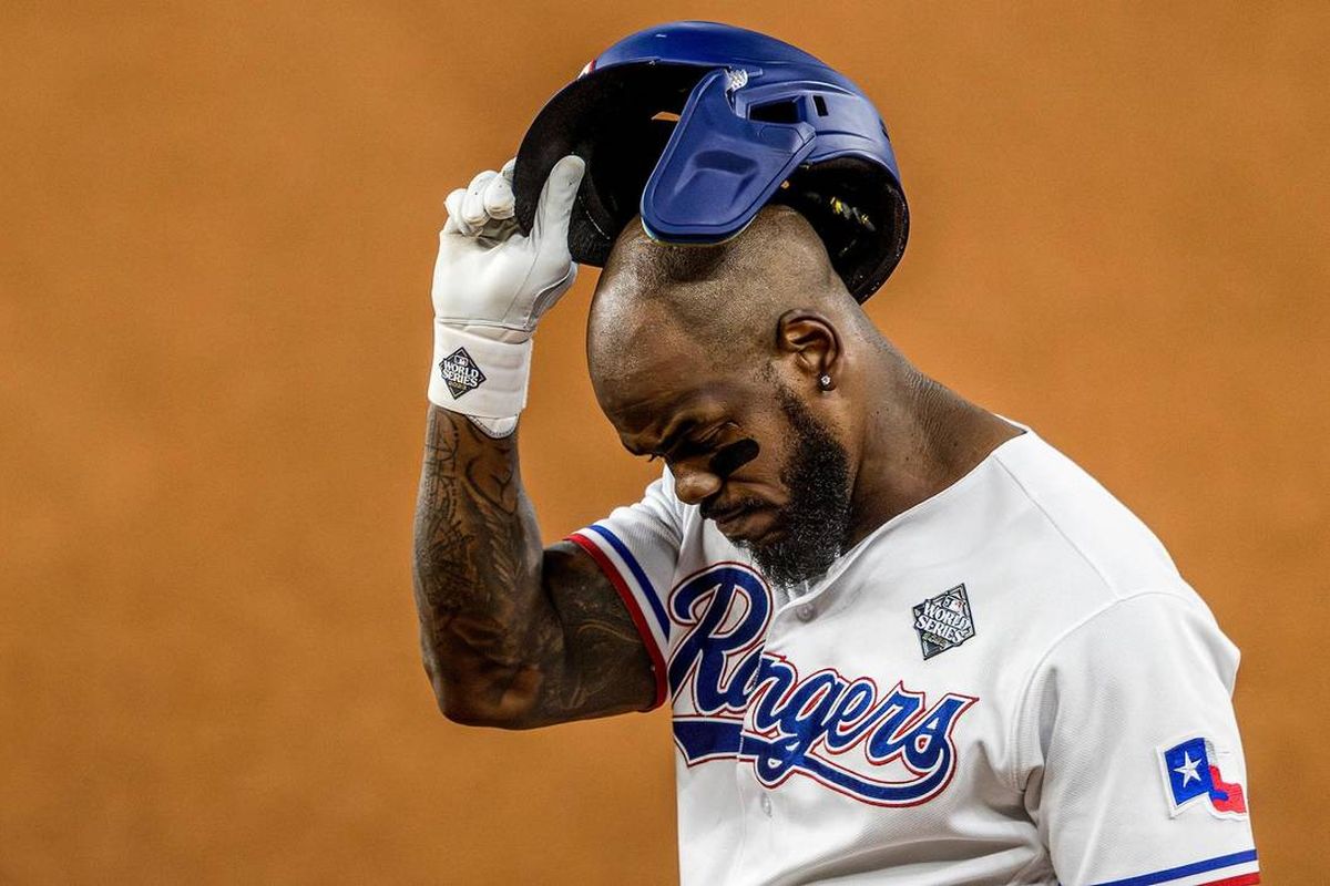 Texas right fielder Adolis Garcia reacts after popping out in the third inning during Game 2 of the World Series against Arizona on Saturday in Arlington, Texas.  (Tribune News Service)