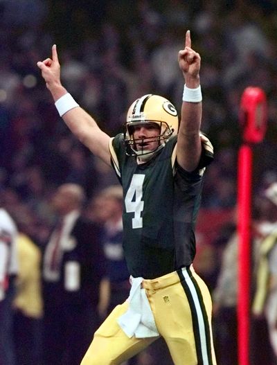 Quarterback Brett Favre piled up record numbers over 20 seasons and led the Green Bay Packers to a Super Bowl win in 1997. (Doug Mills / Associated Press)