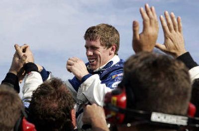 
Carl Edwards is lifted in celebration. 
 (Associated Press / The Spokesman-Review)