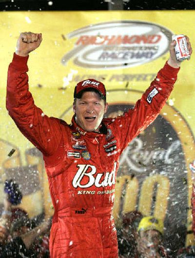 
Dale Earnhardt Jr. celebrates his win in the NASCAR Nextel Cup Crown Royal 400.
 (Associated Press / The Spokesman-Review)