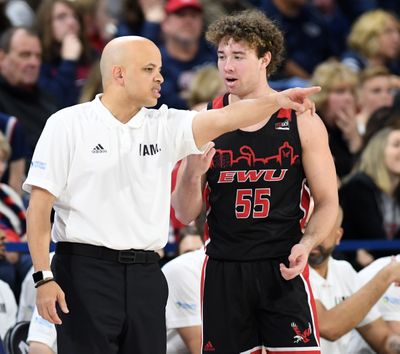 Eastern Washington University coach Shantay Legans has chat time with guard Ellis Magnuson during the Gonzaga game, Saturday. Dec. 21, 2019, in the McCarthey Athletic Center.Dan Pelle/THE SPOKESMAN-REVIEW  (DAN PELLE)