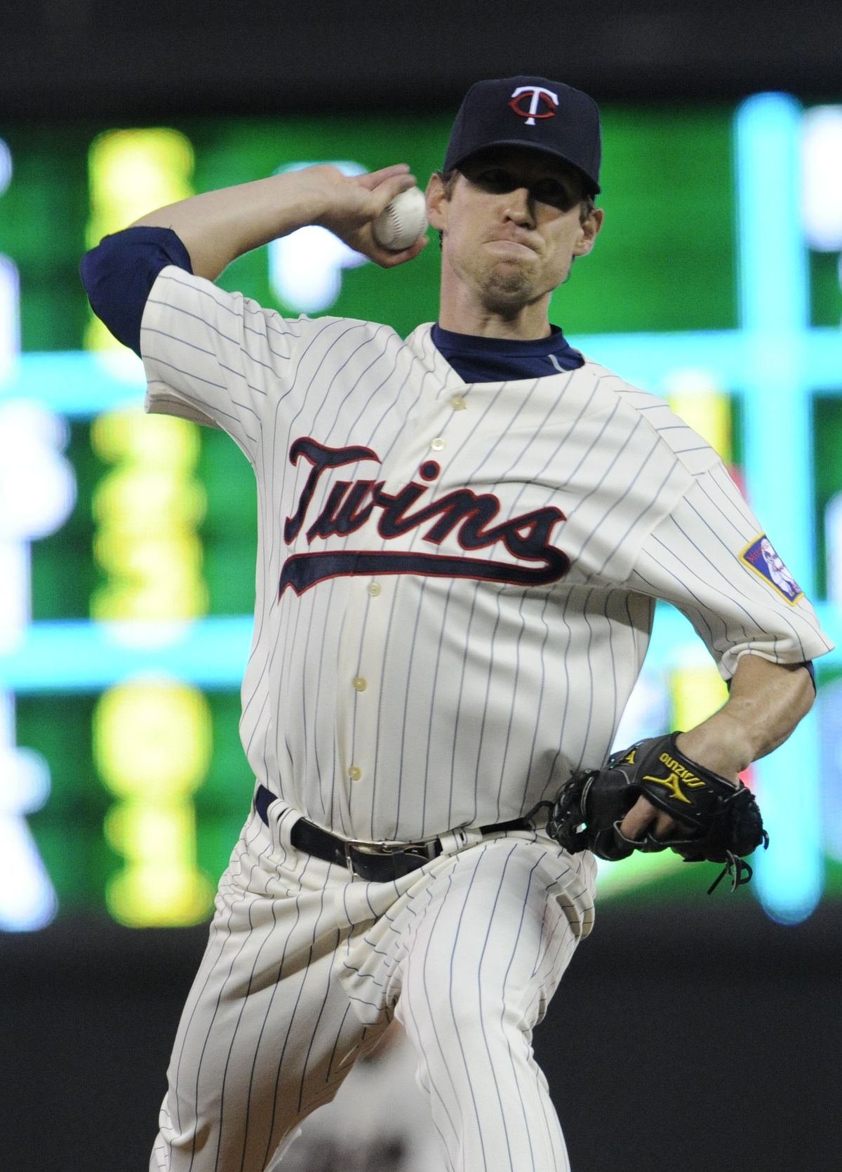 Minnesota Twins pitcher Kevin Slowey throws against the Seattle Mariners in the first inning of a baseball game on Wednesday, Sept. 21, 2011, in Minneapolis. (Jim Mone / Associated Press)