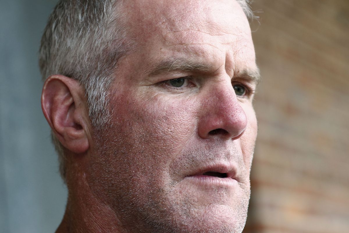 FILE - Former NFL quarterback Brett Favre speaks to the media in Jackson, Miss., Oct. 17, 2018. On Monday, May 9, 2022, the Mississippi Department of Human Services sued Favre, three former pro wrestlers and several other people and businesses to try to recover millions of misspent welfare dollars that were intended to help some of the poorest people in the U.S.  (Rogelio V. Solis)