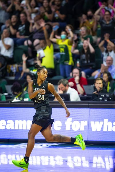 Fans cheer after Storm guard Jewell Loyd hits a 3-pointer over Mercury center Brittney Griner to put Seattle up 78-72 within two minutes to play as the Seattle Storm take on the Phoenix Mercury at the Angel of the Winds Arena in Everett Sunday July 11, 2021. (Bettina Hansen / Seattle Times)