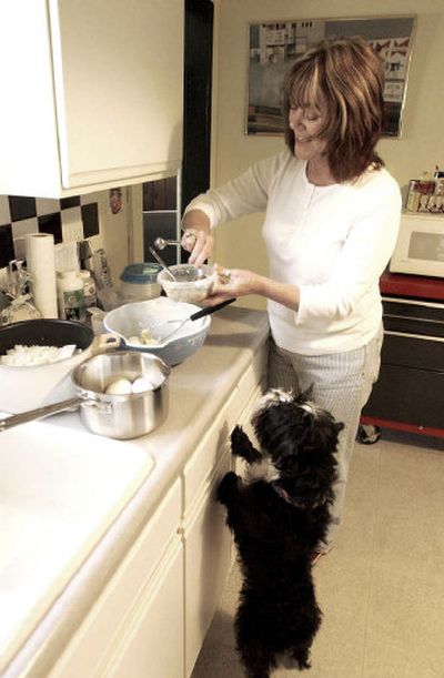 
Jeri Arnold is among a growing number of pet owners who are opting to make their own pet food mix following a recent massive pet food recall. 
 (Photos by J. Bart Rayniak / The Spokesman-Review)