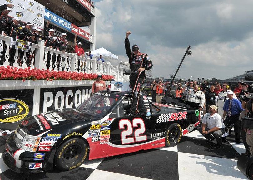 Joey Coulter, driver of the #22 RCR/darrellgwynnfoundation.com Chevrolet, celebrates in Victory Lane after winning the NASCAR Camping World Truck Series Pocono Mountains 125 at Pocono Raceway on August 4, 2012 in Long Pond, Pennsylvania. (Photo by Drew Hallowell/Getty Images for NASCAR) (Drew Hallowell / Getty Images North America)