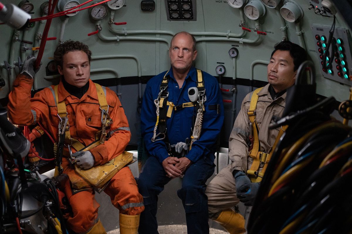 Left to right, Finn Cole stars as Chris Lemons, Woody Harrelson as Duncan Allcock and Simu Liu as Dave Yuasa in “Last Breath,” a Focus Features release. (Focus Features)