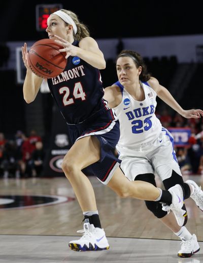 Belmont guard Jenny Roy (24) drives the ball down the court past Duke forward/center Jade Williams (25) during a first-round game in the NCAA women's college basketball tournament in Athens, Ga., Saturday, March. 17, 2018. (Joshua L. Jones / Associated Press)