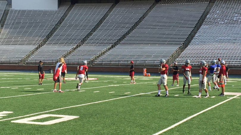 (The Washington State Cougars practice in Martin Stadium for the first time this season.)