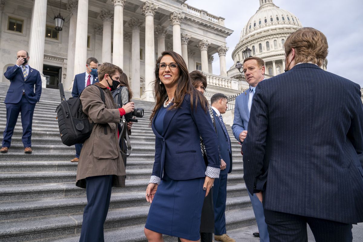 In this Jan. 4, 2021 photo, Rep. Lauren Boebert, R-Colo., center, joins other freshman Republican House members for a group photo at the Capitol in Washington. The district