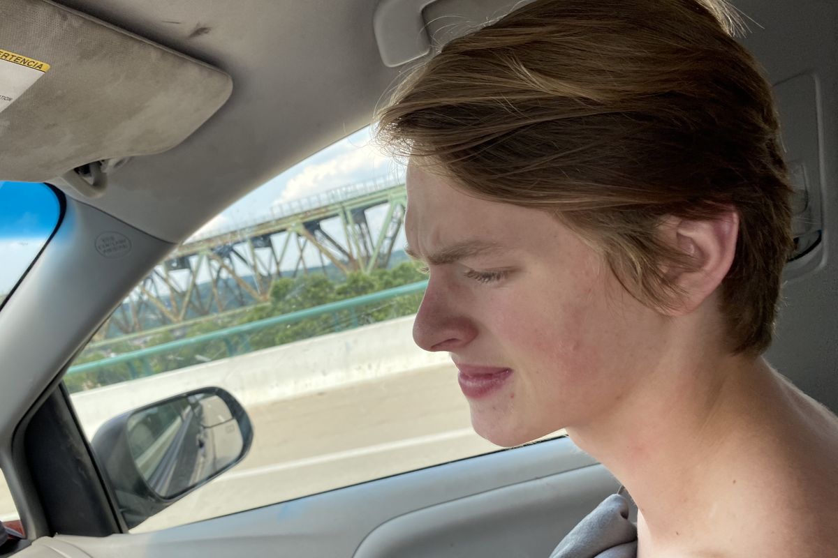 Eddie Condran pays close attention to his father Ed Condran’s driving.  (Ed Condran/The Spokesman-Review)