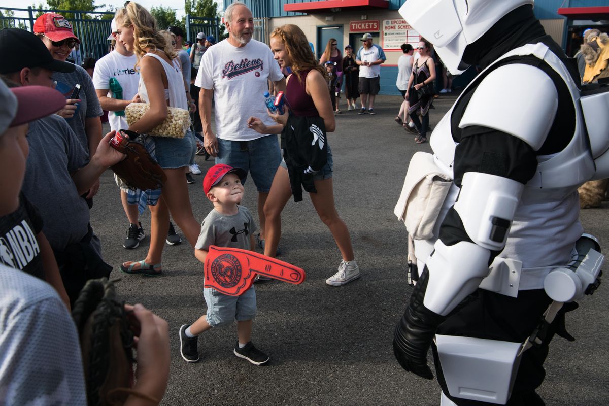 Jaxson Wahl, 3, introduces himself to a Storm Trooper during the Spokane Indians’ Star Wars Night on Friday at Avista Stadium. (Tyler Tjomsland / The Spokesman-Review)