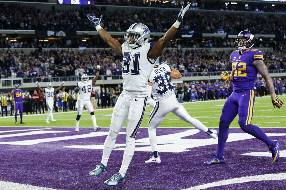 Dallas Cowboys free safety Byron Jones (31) celebrates in front of Minnesota Vikings tight end Kyle Rudolph, right, after breaking up a pass in the end zone during the second half of an NFL football game Thursday, Dec. 1, 2016, in Minneapolis. The Cowboys won 17-15. (Jim Mone / Associated Press)