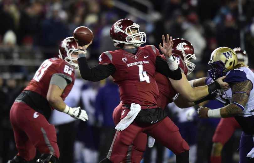 WSU quarterback Luke Falk got valuable experience in the final three games of 2014. (Tyler Tjomsland)