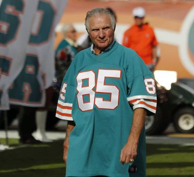 In this Dec. 16, 2012 photo, Nick Buoniconti, former Miami Dolphins player and member of the 1972 undefeated team, in introduced during the half time show of an NFL football game against the Jacksonville Jaguars, in Miami. Pro Football Hall of Fame middle linebacker Nick Buoniconti, an undersized overachiever who helped lead the Miami Dolphins to the NFL’s only perfect season, has died at the age of 78. Bruce Bobbins, a spokesman for the Buoniconti family, said he died Tuesday, July 30, 2019, in Bridgehampton, N.Y. (John Bazemore / Associated Press)