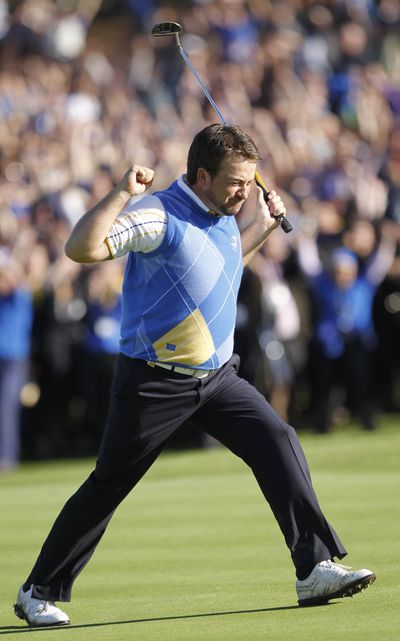  Europe's Graeme McDowell reacts after putting on the 16th green on the final day of the 2010 Ryder Cup golf tournament at the Celtic Manor Resort in Newport, Wales, Monday, Oct.  4, 2010.  (Peter Morrison / Associated Press)