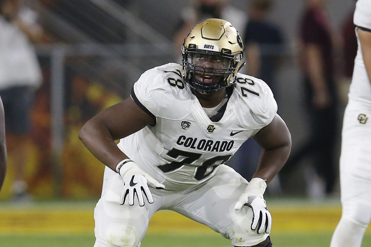 In this Sept. 2019 photo, Colorado offensive lineman William Sherman gets set at the line in Tempe, Ariz. The scouts were there in big numbers. But NFL prospects who were timed and tested, poked and prodded at the pro days didn’t have the usual contingent of underclassmen looking on and offering their support.  (Associated Press)