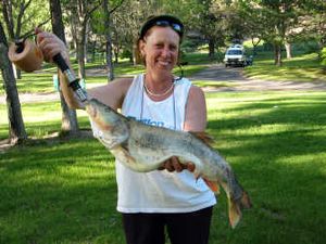 
Deer Park's Pamela Ramsden displays the state-record pikeminnow she caught last week in the Snake River. Photo courtesy of Brian Ramsden
 (Photo courtesy of Brian Ramsden / The Spokesman-Review)