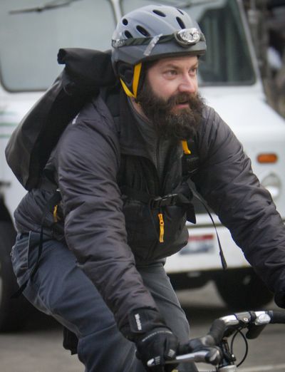 Barton Kline is seen on a food delivery run in downtown Boise. (Associated Press)
