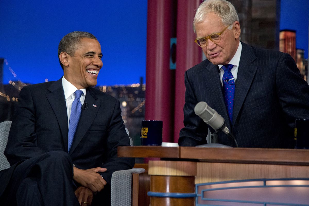 President Barack Obama talks with David Letterman on the set of the "Late Show With David Letterman" at the Ed Sullivan Theater, Tuesday, Sept. 18, 2012, in New York. (Carolyn Kaster / Associated Press)