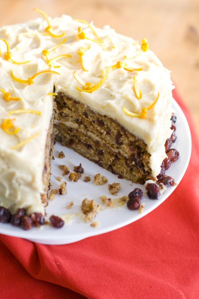 This holiday cranberry-pear layer cake combines ginger, cinnamon and cardamom for rich, warm flavors. (Associated Press)